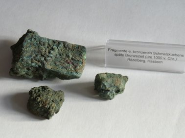 Bronzezeitlicher Depotfund, teileingeschmolzenes Beil, Ritzelberg/Hasborn, um 1000 v.Chr.